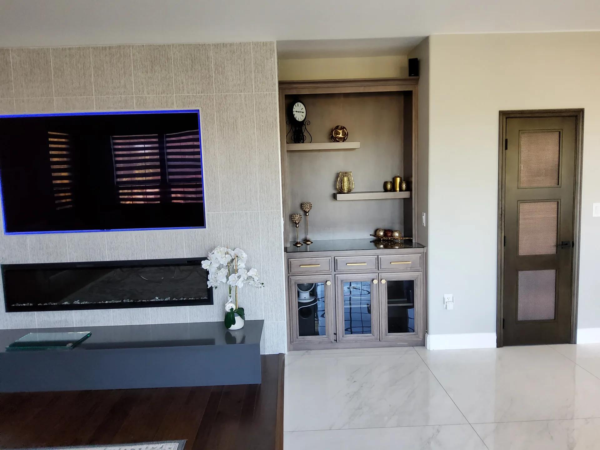 Refinished living room built-ins in driftwood grey